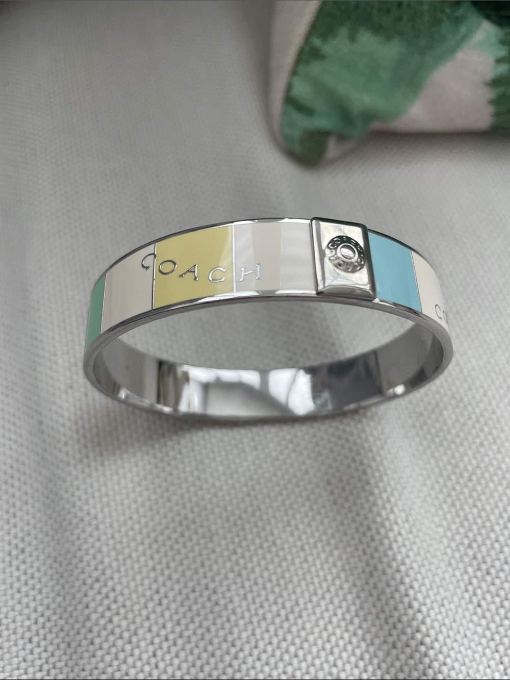 Coach Bangle Bracelet in Mint, White, Pale Yellow, Light Blue, and Coral